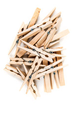 Pile of clothespins isolated on white background