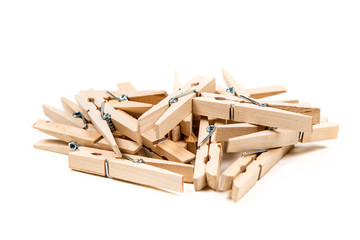 Pile of clothespins isolated on white background