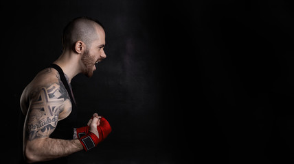 Shout concept. Strong man cry with open mouth. Agrassive emotion with free space for a text or...