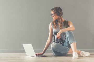 Beautiful woman with gadget