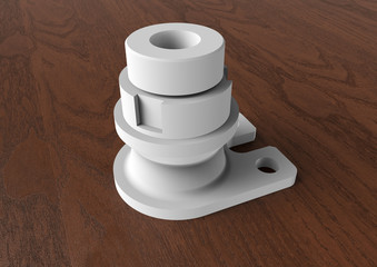 Metal engineering part on a wooden background