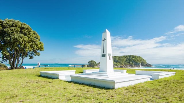 Tauranga NZ White Religion Memorial Landmark on Grass Lawn Next to the Main Beach on a Sunny Summers Day in the Bay of Plenty Region