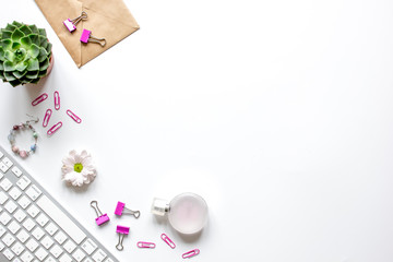 female white desktop with flowers top view