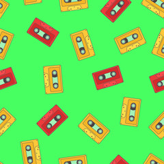 Seamless pattern with red and yellow retro audio tape on green background.
