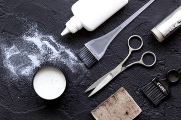 hairdresser profession select of hair color on dark background
