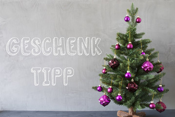 Fototapeta na wymiar Christmas Tree, Cement Wall, Geschenk Tipp Means Gift Tip