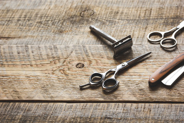 Tools for cutting beard barbershop on wooden background
