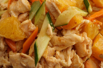 Chinese food. Chicken with orange and vegetables