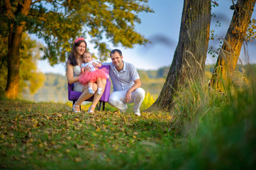 Fototapeta premium family with the little daughter outdoors