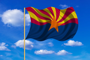 Flag of Arizona waving on blue sky background