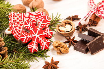 Christmas gingerbread red cookies, walnuts and chocolate.