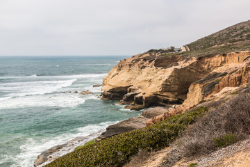 Eroded cliffs along the ocean at the Point Loma tide pools in San Diego, California.