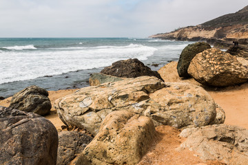 Giant boulders and cliffs at the Point Loma tide pools in San Diego, California.