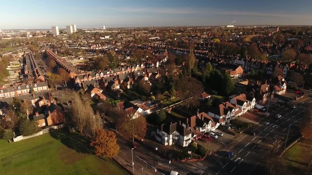 Low aerial shot of Edgbaston, Birmingham, UK. Descending over a busy road junction.