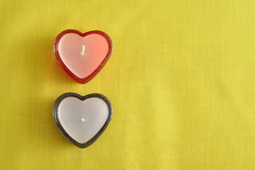 Valentine Day. Two heart shape candles.