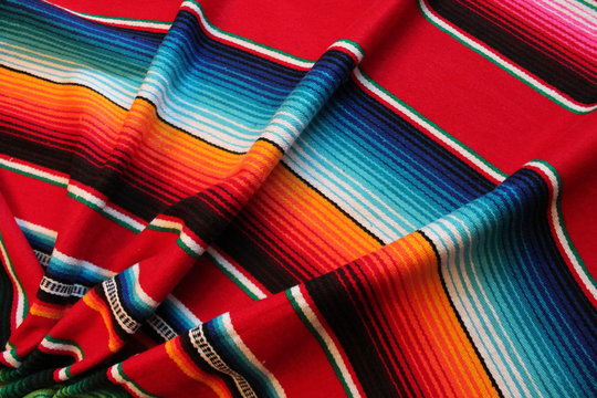 cinco de mayo Mexican blanket poncho Mexico background rug blanket fiesta background with stripes copy space pattern stock photo photograph image picture 
