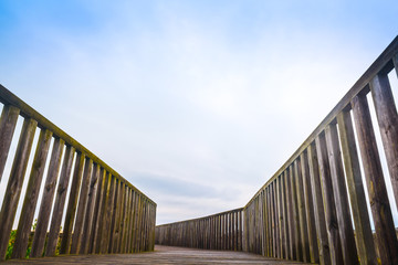 Wooden walking path at the beach. Obidos Lagoon. Portugal