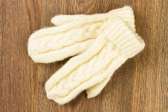 white knitting mittens