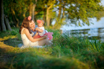 Fototapeta premium happy family walks in the park