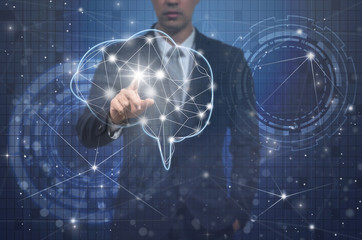 Businessman hand pointing the brain over the Innovation Technolo