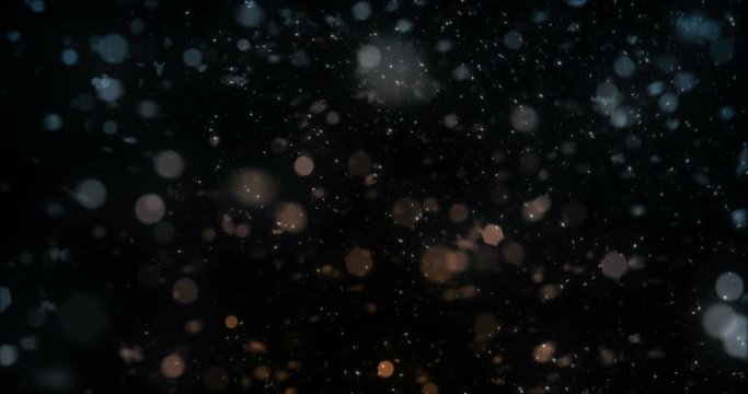 Motion background falling defocused orange blue bokeh lights snow loop 4k