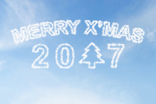 Merry xmas 2017 and christmas tree cloud on blue sky
