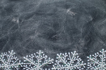 Snowflakes on a black chalkboard