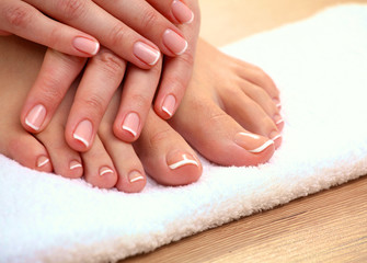 Obraz na płótnie Canvas Closeup photo of a beautiful female feet with pedicure