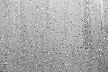 Closeup water condensation on window glass background - obrazy, fototapety, plakaty