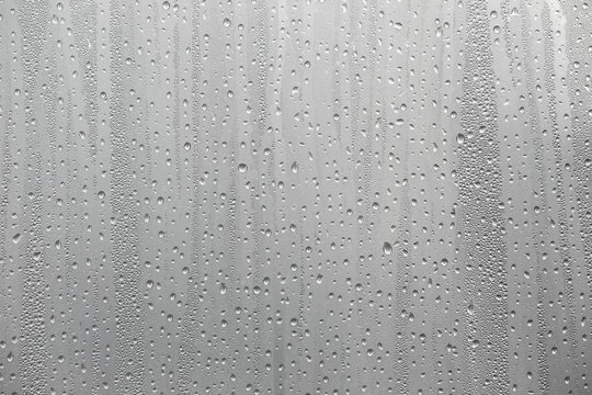 Closeup water condensation on window glass background