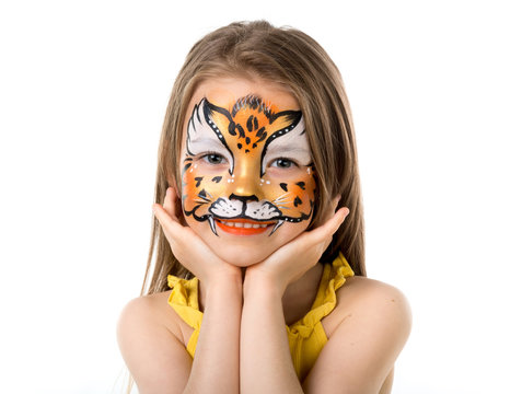 cute little girl with painted face