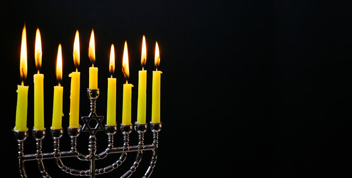Jewish holiday hannukah with menorah traditional