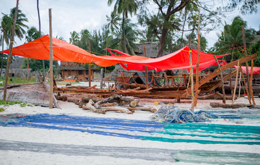 fishermen and nets on the beach of fishing willage