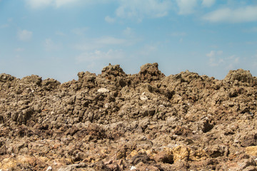 mound of earth.with blue sky