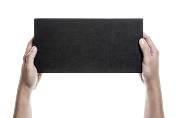 Two hands hold a empty(blank) black box isolated white.