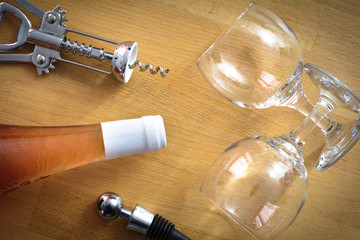 Bottle of wine with glasses and corkscrew © Gael Fontaine