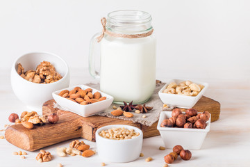 Vegan milk from nuts in glass jar 