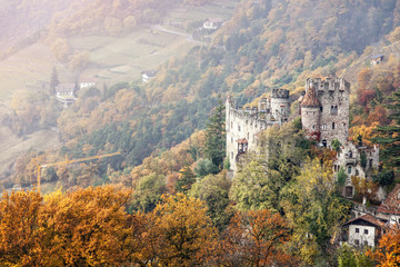 Old castle Brunnenburg in the Alps mountains, Italy, South Tyrol