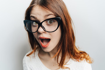 Obraz premium funny woman puffed cheeks. Woman close-up in funny sight 