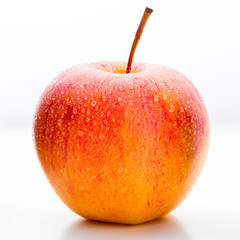 Ripe apple on a white background