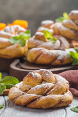 Homemade cinnamon buns with pumpkin