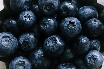 Fresh ripe pile of blueberries macro close up