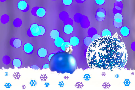 Новый год. \ Красивое новогоднее боке, синие шары,снег,снежинки.