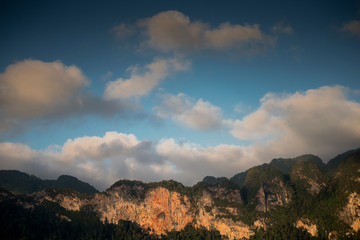 Fototapeta na wymiar View of mountain and cloud in Khao Sok National Park, ratchaprapha dam Suratthani Thailand