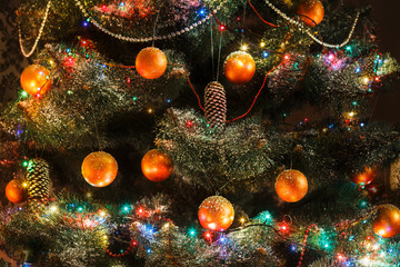 Obraz na płótnie Canvas Beatiful christmas decorated tree in shining lights