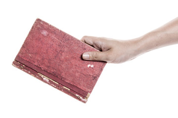 Two hands hold a empty(blank) vintage book spread isolated white.