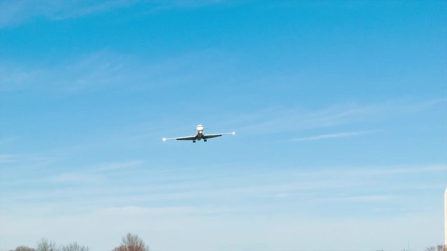 Regional Jet Flying Over Gravelly Point Park on Final Approach into Ronald Reagan National Airport in Washington DC