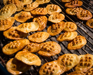 oscypek. polish smoked cheese on a grill