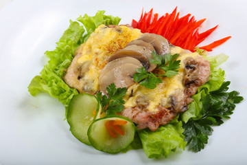 Pork steak with mushroom and cheese