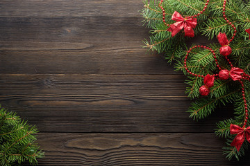 Christmas wooden background with fir tree